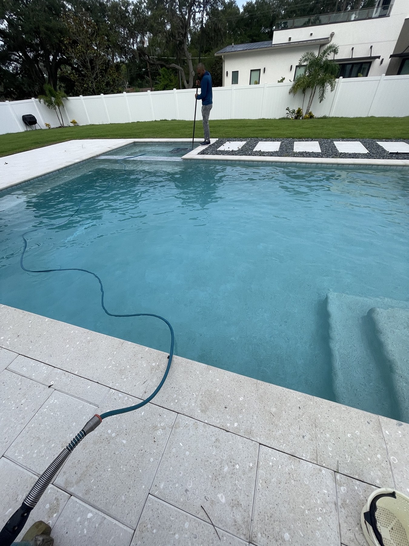 Tampa VIP technician performing pool care at a Tampa residence