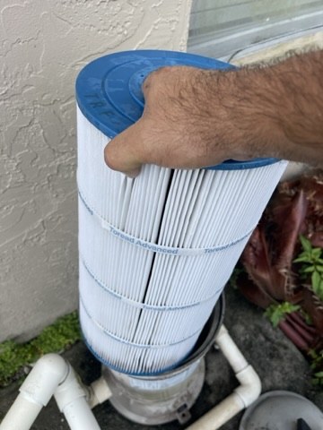 Pool filter being maintained