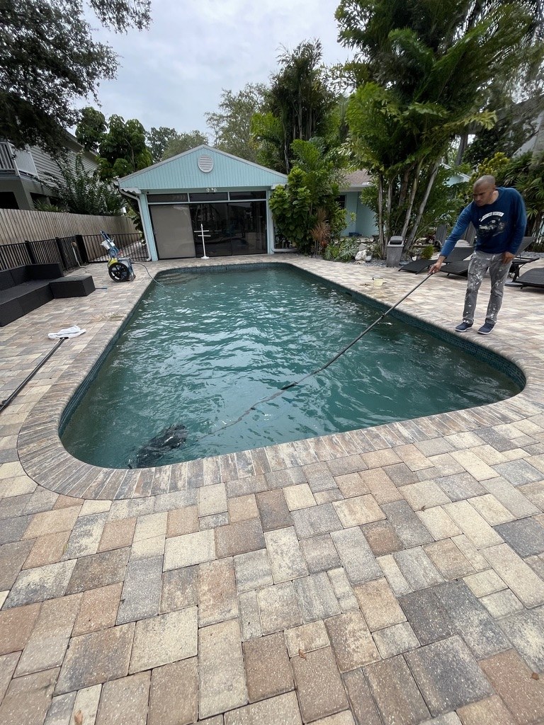 Tampa VIP technician performing pool service